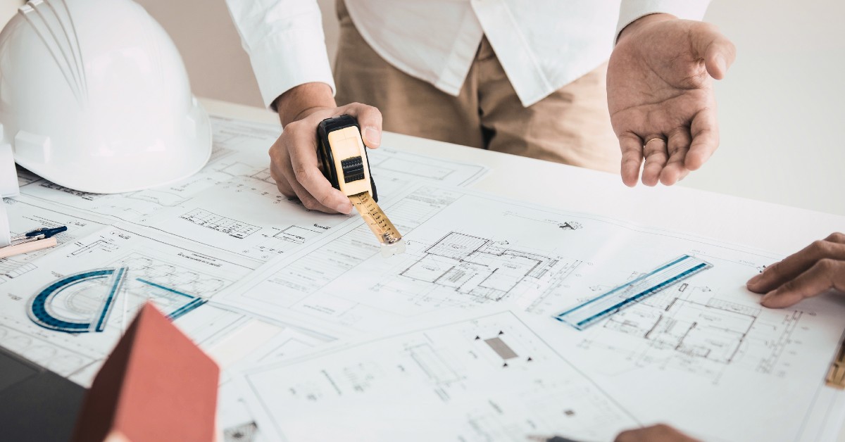 image: architects review project plans