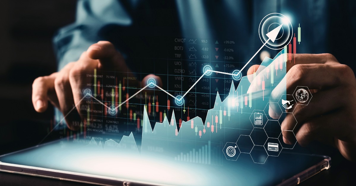 image: hands of person using tablet with as data insights pop up in 3D from the tablet