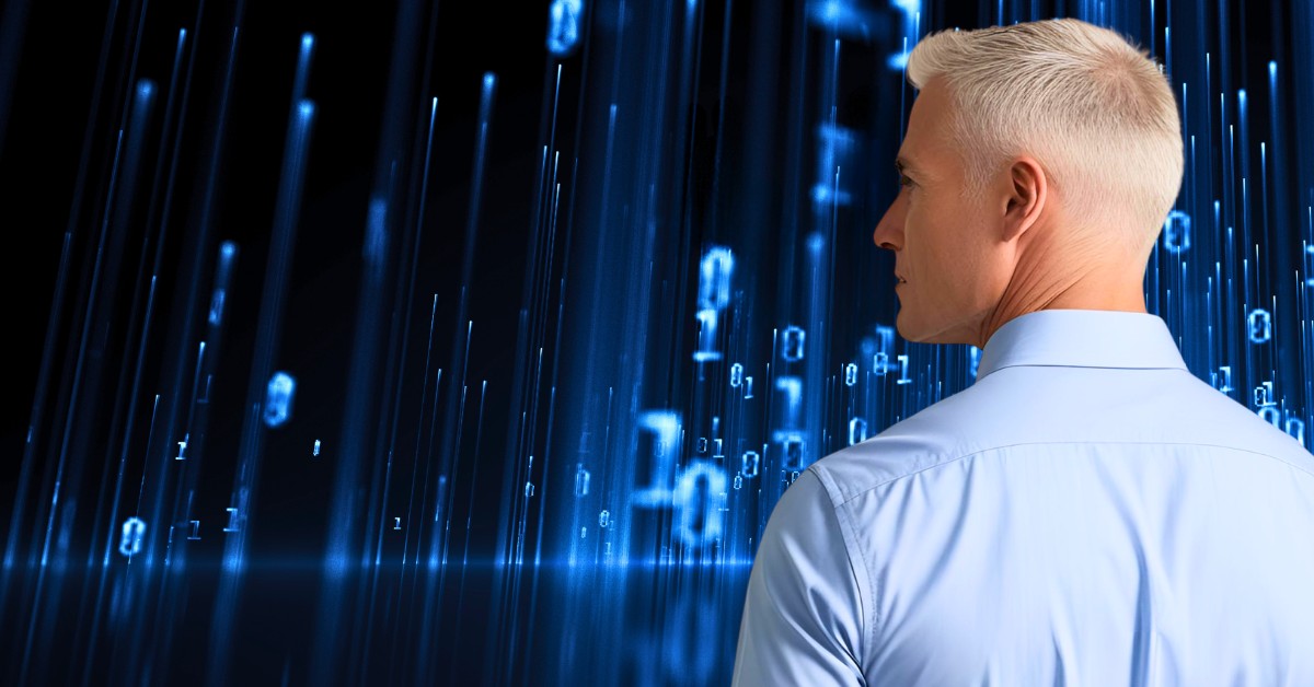 image: man in front of cascading data code.