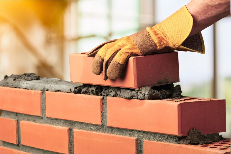 Partial brick wall in process of being built